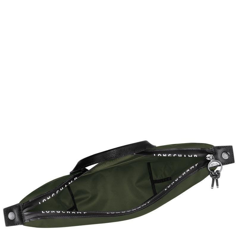 Longchamp Le Pliage Energy L backpack in khaki, showing the durable nylon bag with leather handles and spacious design.