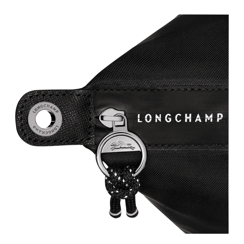 Black Longchamp Le Pliage Energy L handbag with structured design and top handles, shown on a plain background.