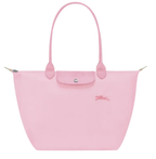 Longchamp Le Pliage Green L tote bag in pink, showcasing its spacious design and durable nylon material.