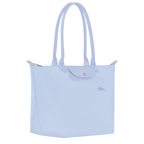 Longchamp Le Pliage green L tote bag in sky blue color, showcasing its spacious design and durable fabric.