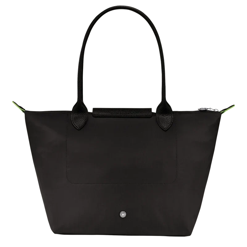 Longchamp Le Pliage Green M tote bag in black leather with foldable design and sturdy handles.