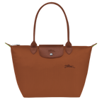 Longchamp Le Pliage Green M Tote bag in Cognac color, showcasing durable fabric and classic design with handles and spacious interior.