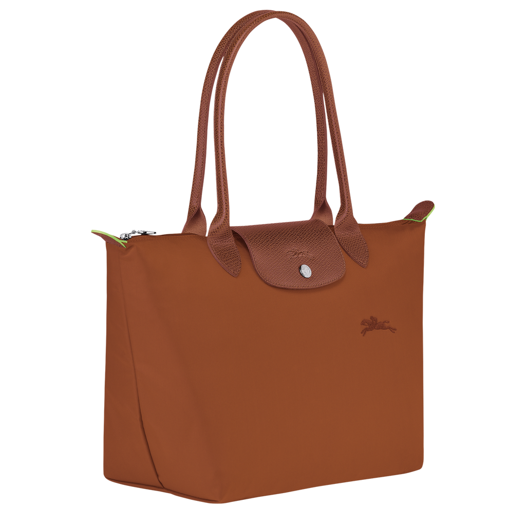 Longchamp Le Pliage Green M Tote bag in Cognac color, showing the lightweight, foldable design with sturdy handles.
