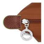 Longchamp Le Pliage Green M Tote bag in Cognac color, showing the folded fabric and sturdy handles.