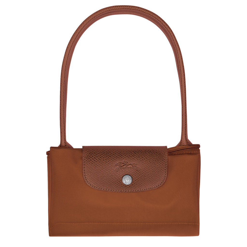 Longchamp Le Pliage Green M tote bag with cognac handles and accents, showcasing the stylish, foldable design on a neutral background.