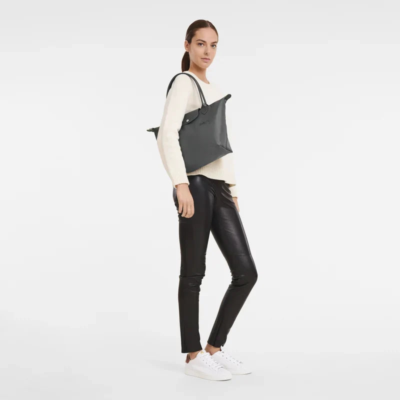 Longchamp Le Pliage Green M tote bag in graphite color, showcasing its durable fabric and sleek design.