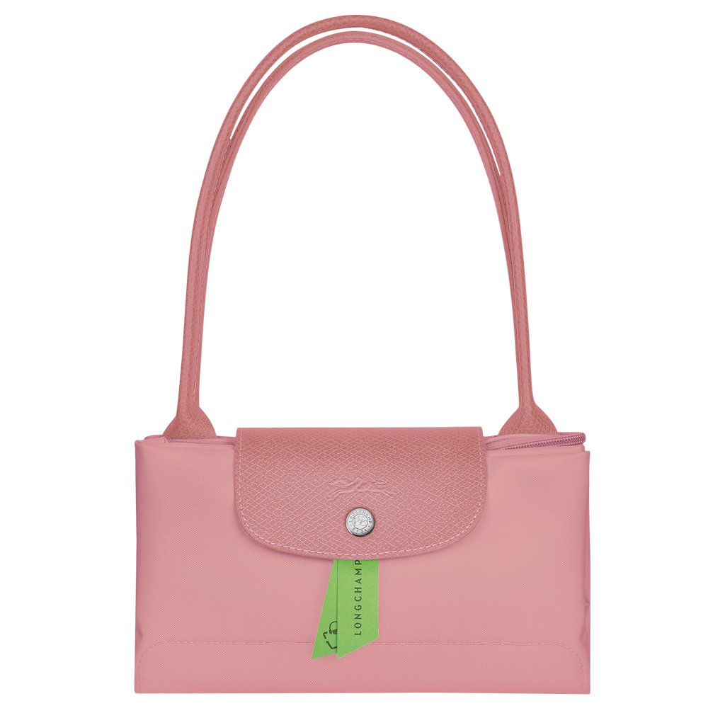 Longchamp Le Pliage green M tote bag with petal pink handles, showing the stylish and lightweight design.