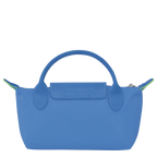 Longchamp Le Pliage green pouch with handle and cornflower blue accents, compact travel bag with a stylish design.