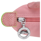 Longchamp Le Pliage green pouch bag with handle and petal pink accents, lightweight and versatile accessory.
