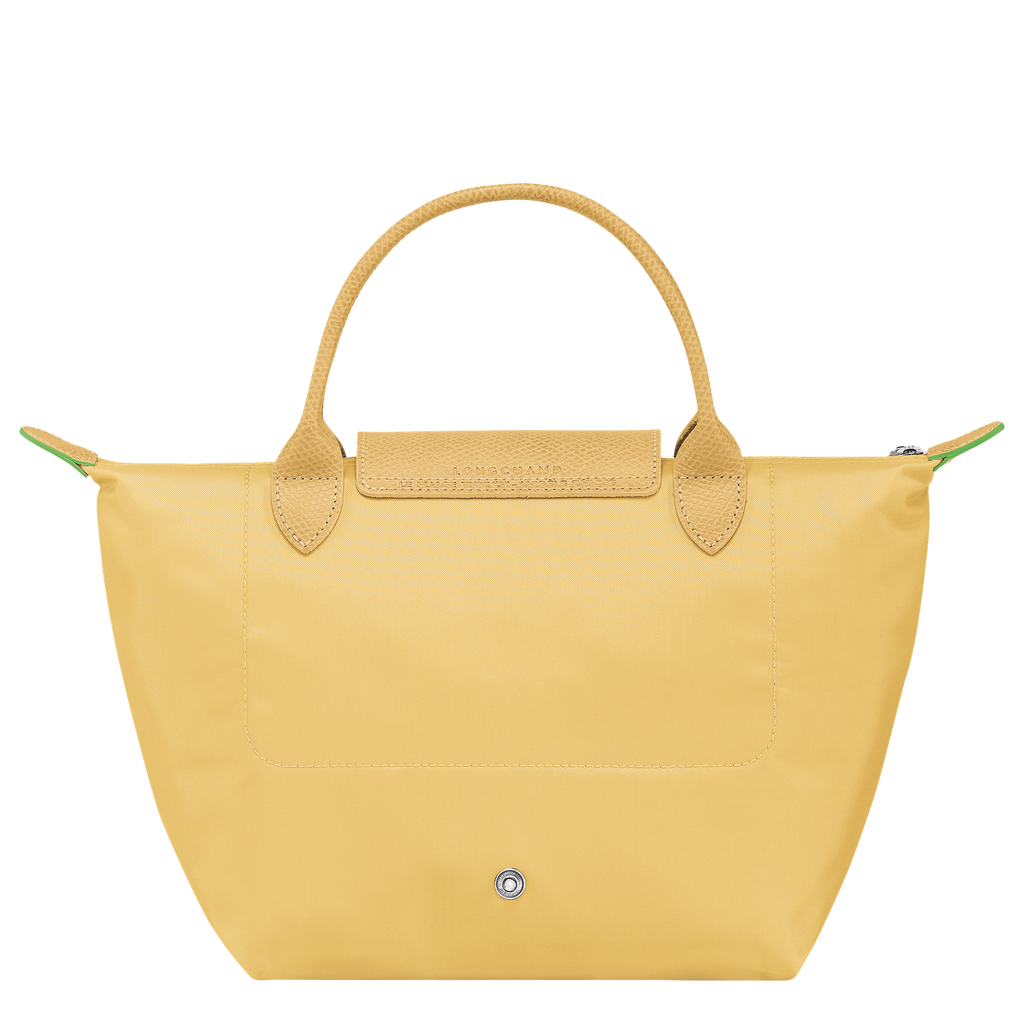 Longchamp Le Pliage Green S handbag in wheat color, featuring a compact bag design with handles, on a plain background.