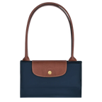 Longchamp Le Pliage Original L tote bag in navy color with durable fabric and leather handles, stylish and lightweight for everyday use.