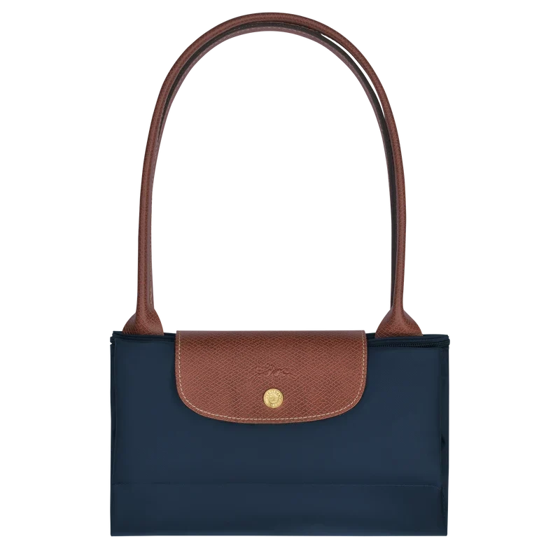 Longchamp Le Pliage Original L tote bag in navy color with durable fabric and leather handles, stylish and lightweight for everyday use.