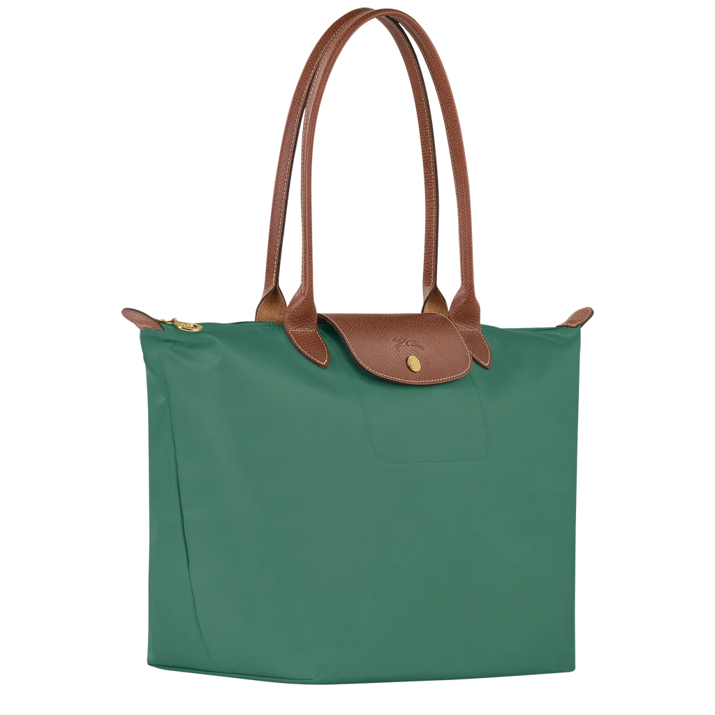 Longchamp Le Pliage Original L Tote bag in sage green, showing its lightweight, foldable design and durable nylon material.