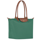 Longchamp Le Pliage Original L Tote bag in sage green, showing its lightweight, foldable design and durable nylon material.