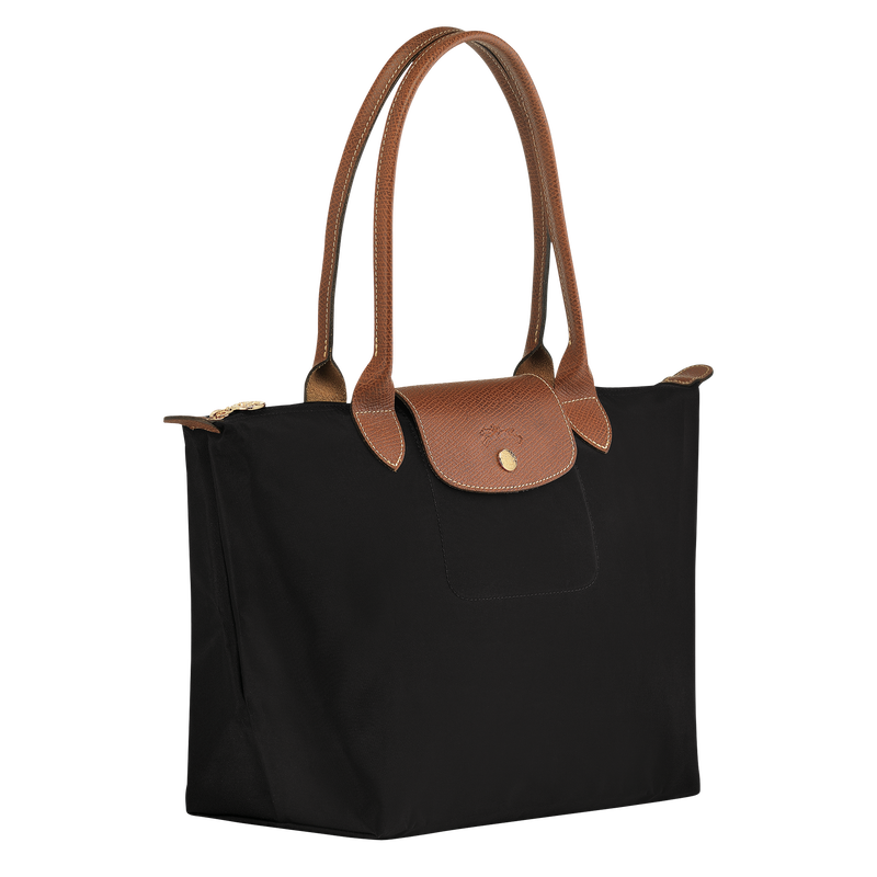 Longchamp Le Pliage Original M tote bag in black, showcasing durable nylon material with leather handles and a foldable design.