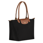 Longchamp Le Pliage Original M tote bag in black, showcasing durable nylon material with leather handles and a foldable design.