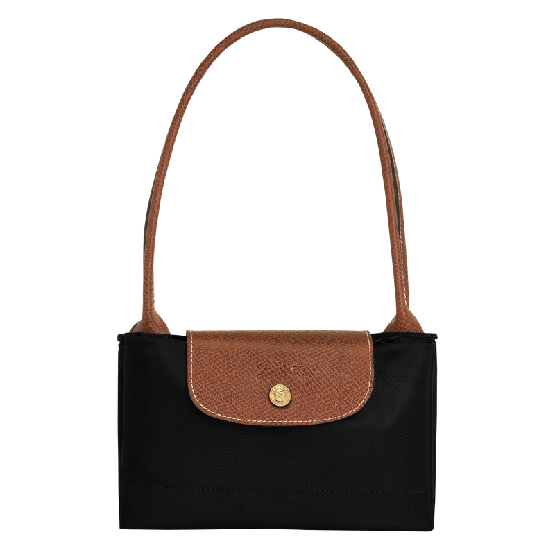 Longchamp Le Pliage Original M Tote Bag in black, showing the durable nylon material and classic design with leather handles.