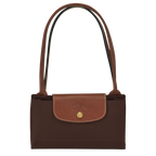 Longchamp Le Pliage Original M Tote bag in ebony, showcasing its classic foldable design and durable nylon material.