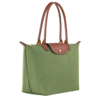 Longchamp Le Pliage Original M Tote bag in Lichen color, showing the durable fabric and classic design with leather handles.