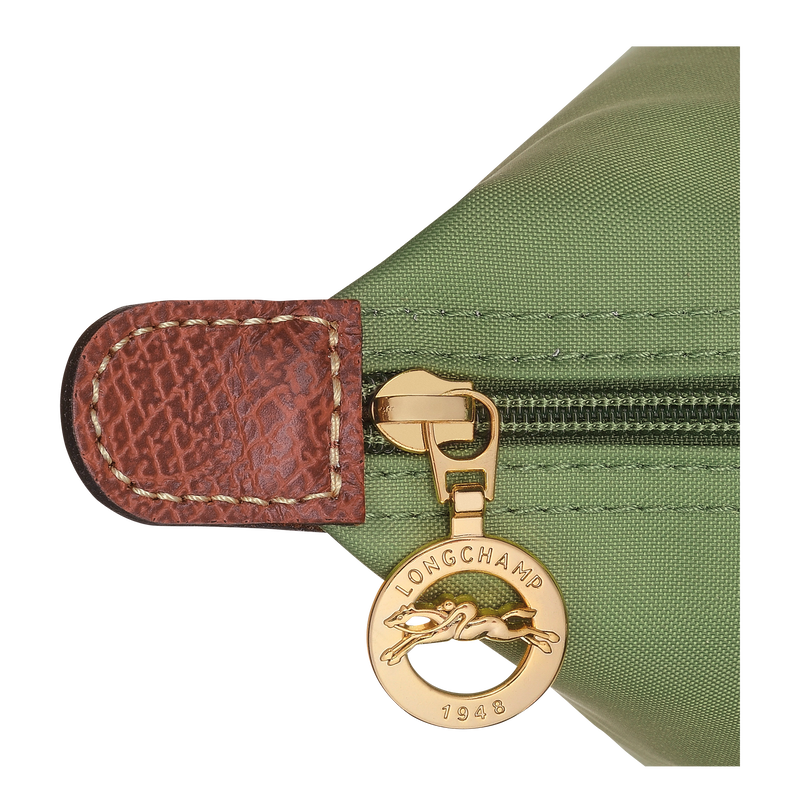Longchamp Le Pliage Original M tote bag in Lichen with lightweight, foldable design and durable canvas material, featuring leather handles.