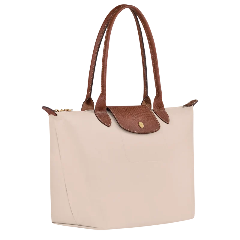 Longchamp Le Pliage Original M tote bag in wine paper material, showing the lightweight, foldable design and classic logo on the front.