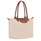 Longchamp Le Pliage Original M tote bag in wine paper material, showing the lightweight, foldable design and classic logo on the front.