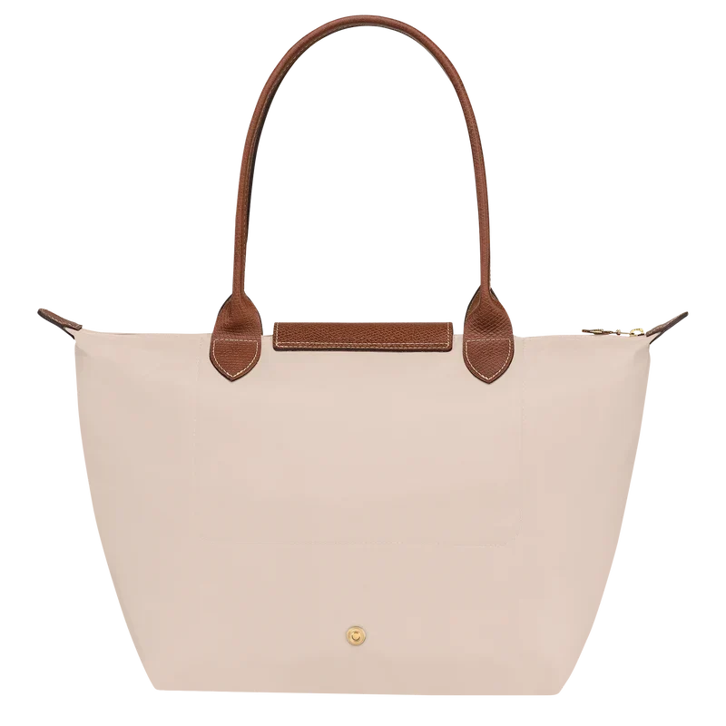 Longchamp Le Pliage Original M tote bag made of paper with a wine color, featuring a classic foldable design.
