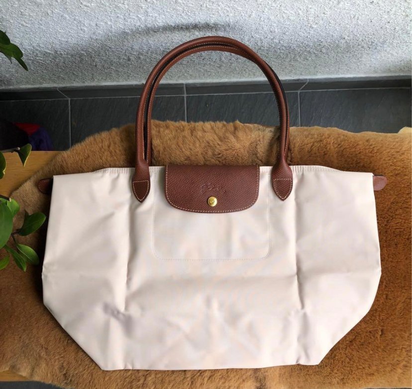Longchamp Le Pliage Original M tote bag in wine paper material, showing the lightweight, foldable design and classic style.
