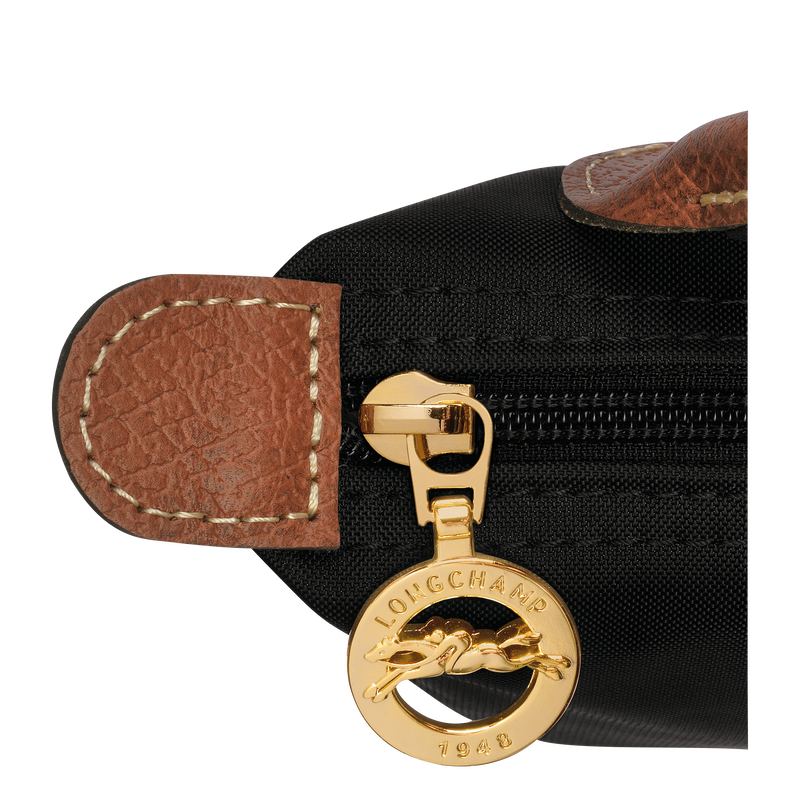 Longchamp Le Pliage Original Pouch with handle in black, lightweight bag with zipper closure and fabric handle.