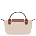 Longchamp Le Pliage Original pouch with handle, wine-colored paper bag featuring a compact, lightweight design with logo branding.
