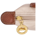 Longchamp Le Pliage Original paper pouch with handle, wine-colored bag with a sleek design and fabric handles.