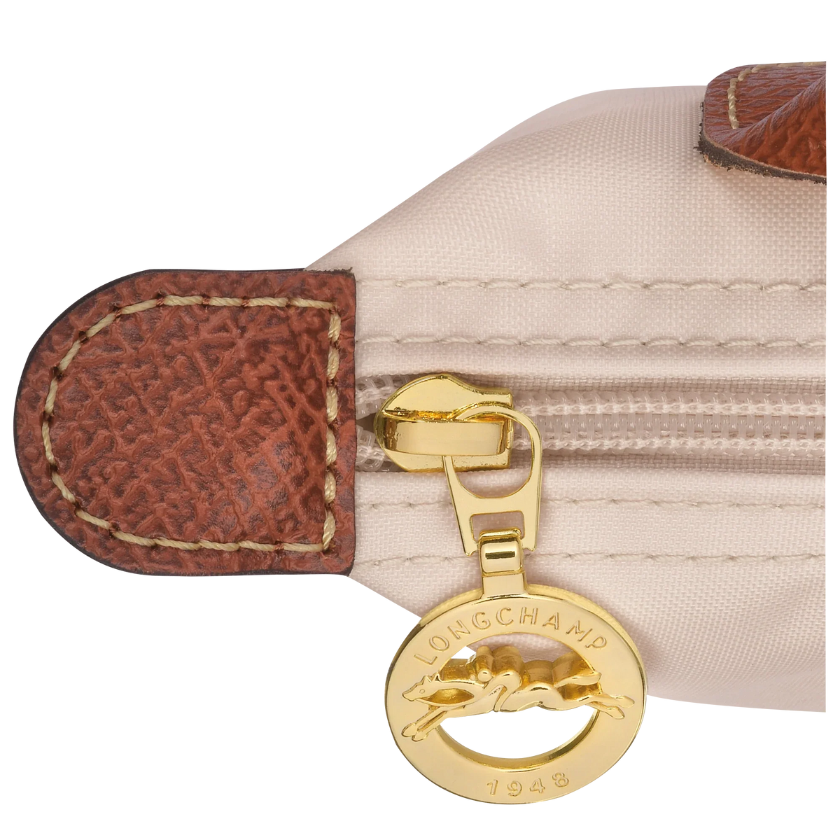 Longchamp Le Pliage Original paper pouch with handle, wine-colored bag with a sleek design and fabric handles.