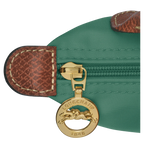Longchamp Le Pliage Original Pouch with handle in sage green, showcasing compact bag with leather accents and fabric body.