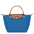 Longchamp Le Pliage Original S handbag in cobalt blue, showcasing lightweight canvas with leather handles and compact design.