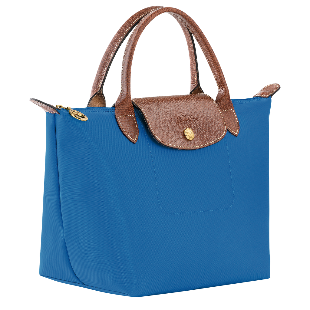 Longchamp Le Pliage Original S handbag in cobalt blue, made of lightweight nylon with leather handles and foldable design.
