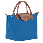 Longchamp Le Pliage Original S handbag in cobalt blue, made of lightweight nylon with leather handles and foldable design.