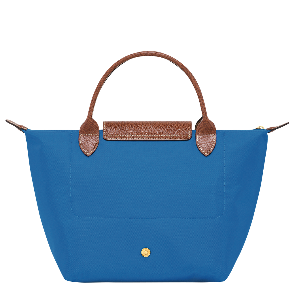 Longchamp Le Pliage Original S handbag in cobalt blue, showcasing a lightweight, foldable bag with leather handles and logo detail.