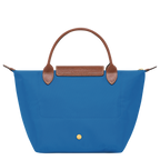 Longchamp Le Pliage Original S handbag in cobalt blue, showcasing a lightweight, foldable bag with leather handles and logo detail.