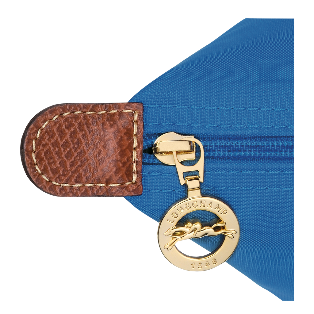 Longchamp Le Pliage Original S handbag in cobalt blue with nylon and leather handles, compact and lightweight design.