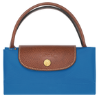 Longchamp Le Pliage Original S handbag in cobalt blue, lightweight nylon bag with leather handles and foldable design.