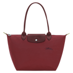 Longchamp Le Pliage Green M Tote Bag featuring a Pomegranate design, showcasing its durable fabric and spacious interior.