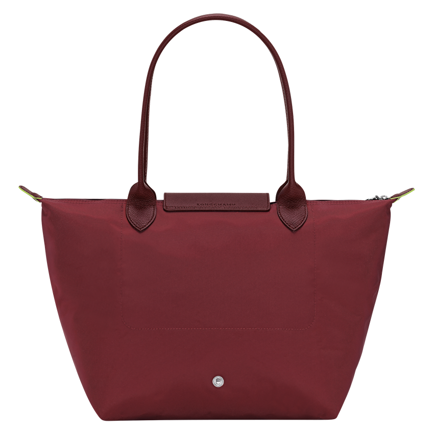Longchamp Le Pliage Green M Tote Bag featuring a pomegranate design, shown with its sleek, foldable style and durable fabric.