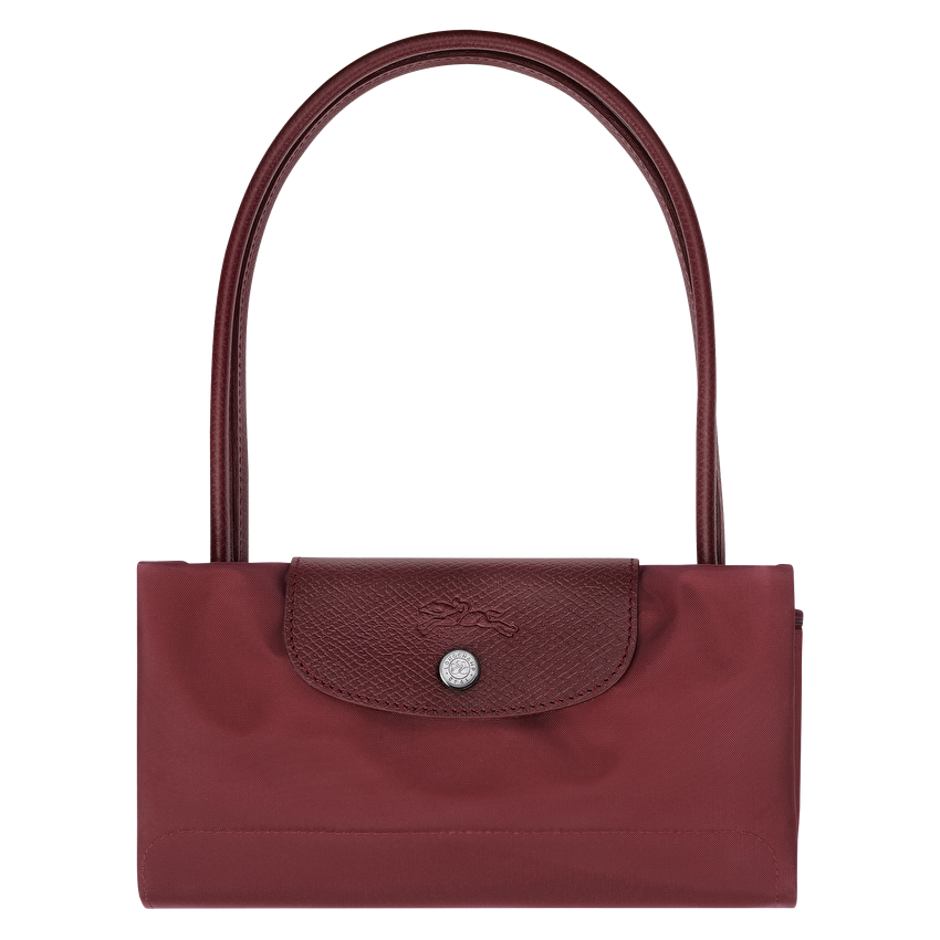 Longchamp Le Pliage Green M Tote Bag featuring pomegranate-colored durable fabric and sturdy handles for versatile carrying.