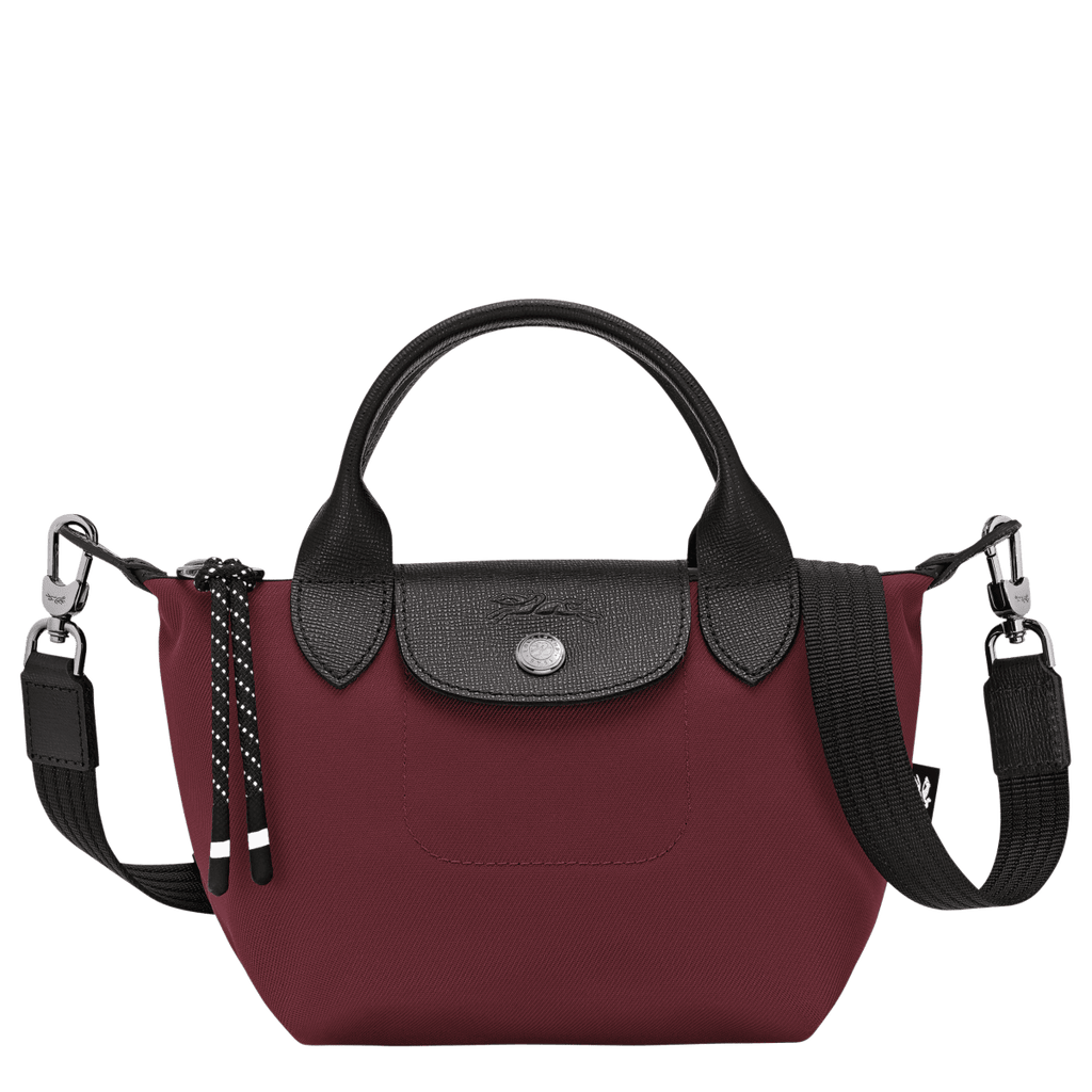 Longchamp Le Pliage Energy XS handbag in lightweight, foldable design with leather handles and neutral color.