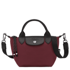 Longchamp Le Pliage Energy XS handbag in lightweight, foldable design with leather handles and neutral color.