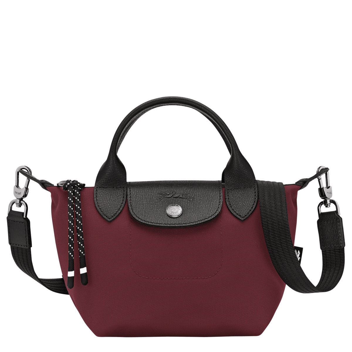 Longchamp Le Pliage Energy XS handbag in lightweight, foldable design with leather handles and neutral color.