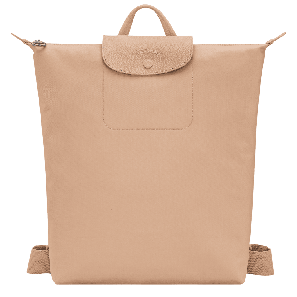 Longchamp Le Pliage One M backpack in beige with foldable design, featuring the iconic nylon tote style and leather handles.