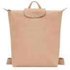 Longchamp Le Pliage One M backpack in beige with foldable design, featuring the iconic nylon tote style and leather handles.