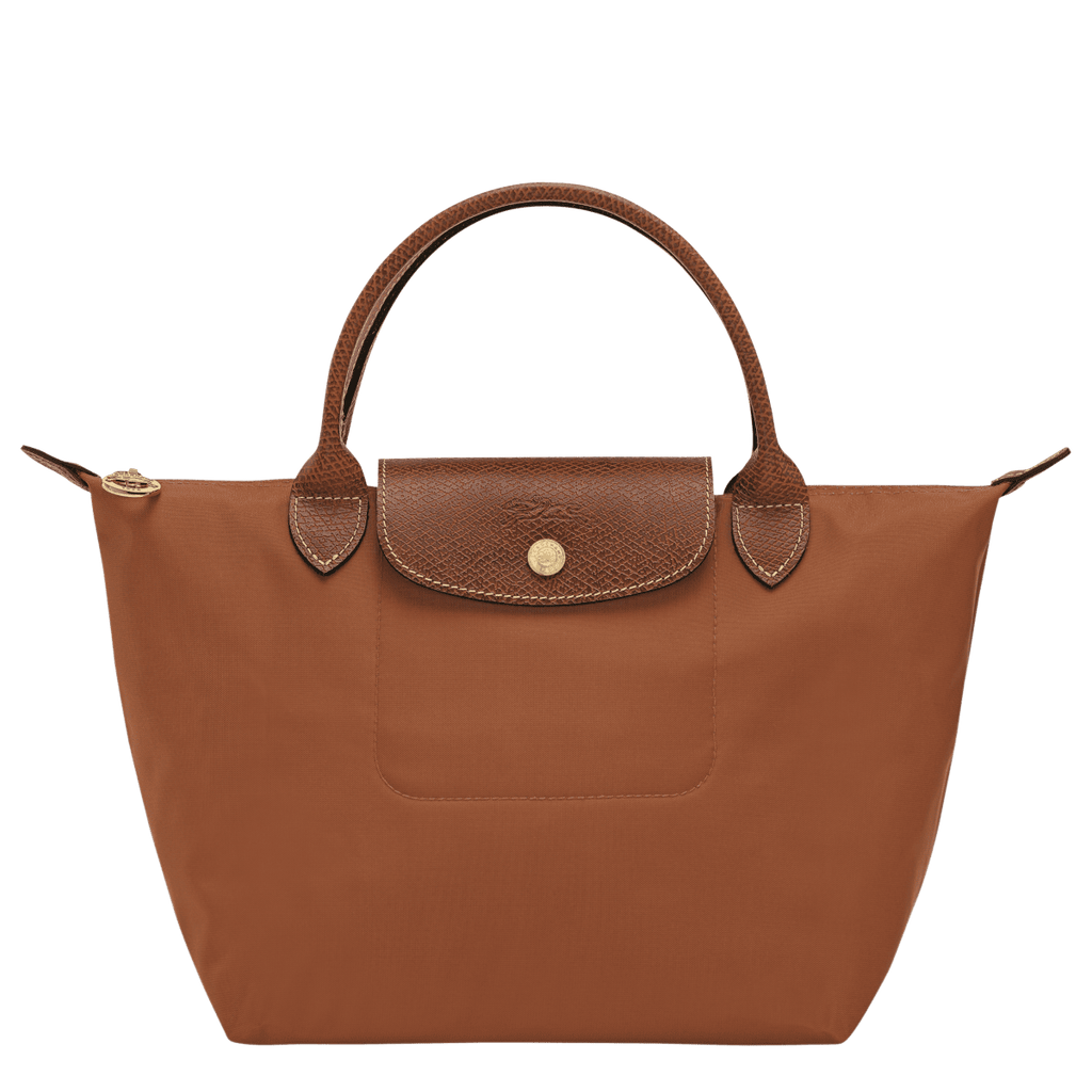 Longchamp Le Pliage Original S handbag in beige nylon with leather handles, folded open showing spacious interior and classic design.