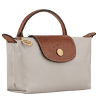 Longchamp Le Pliage Original Pouch with handle featuring durable nylon material and a sleek, compact design.
